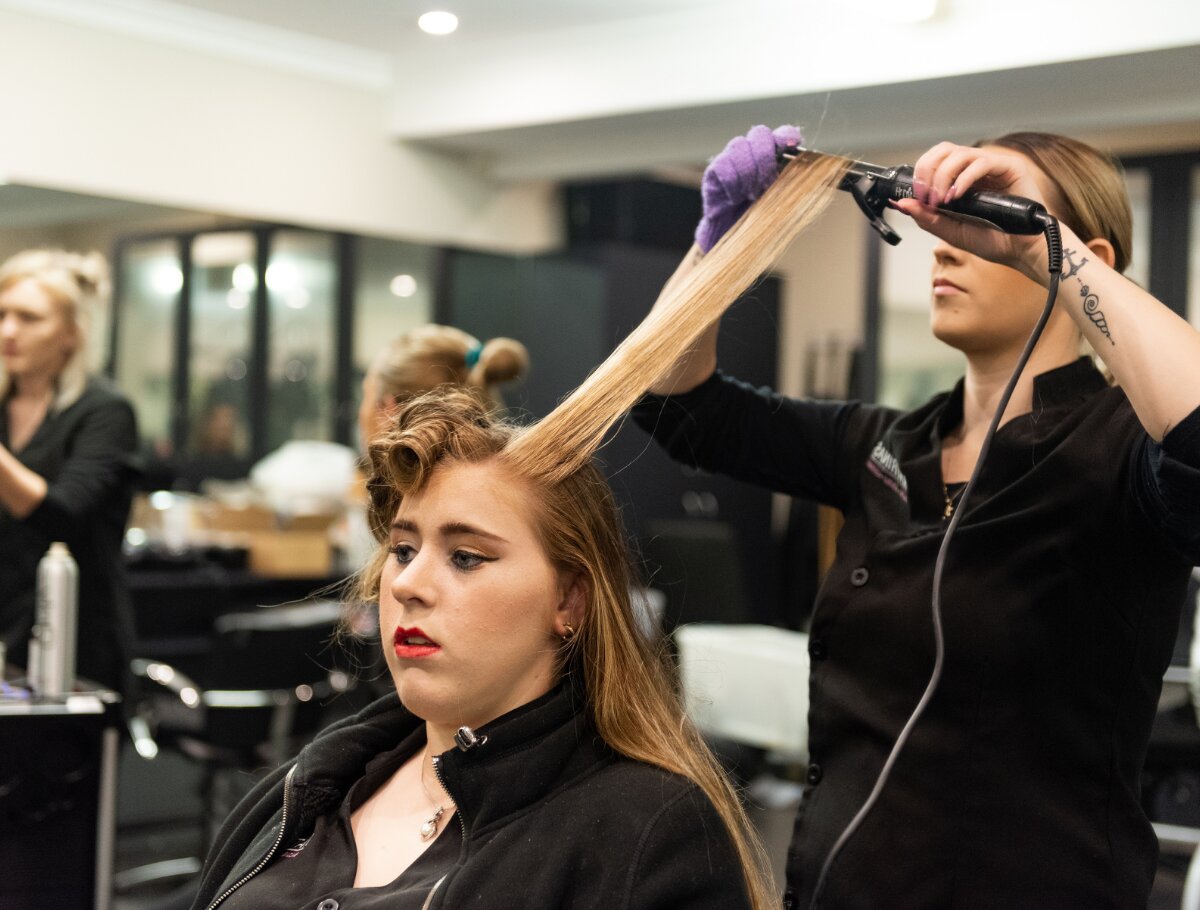 Student training at Katrinas hair clinic